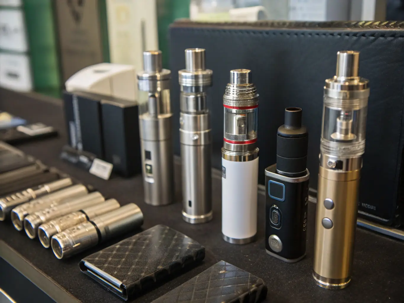 An image showcasing a variety of pod systems, with different designs and colors, placed on a table with vape-related accessories. The lighting is soft and inviting, emphasizing the user-friendly nature of pod systems.